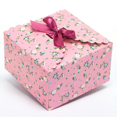 light pink floral gift boxes, flower edge gift boxes, large favor gift boxes, scallop edge gift boxes, favor boxes, gift boxes, pastel gift boxes with ribbons, floral pattern gift boxes, baby shower favor gift boxes, wedding favor gift boxes, teacher's appreciation week gift boxes, gift boxes in bulk | Gift Expressions
